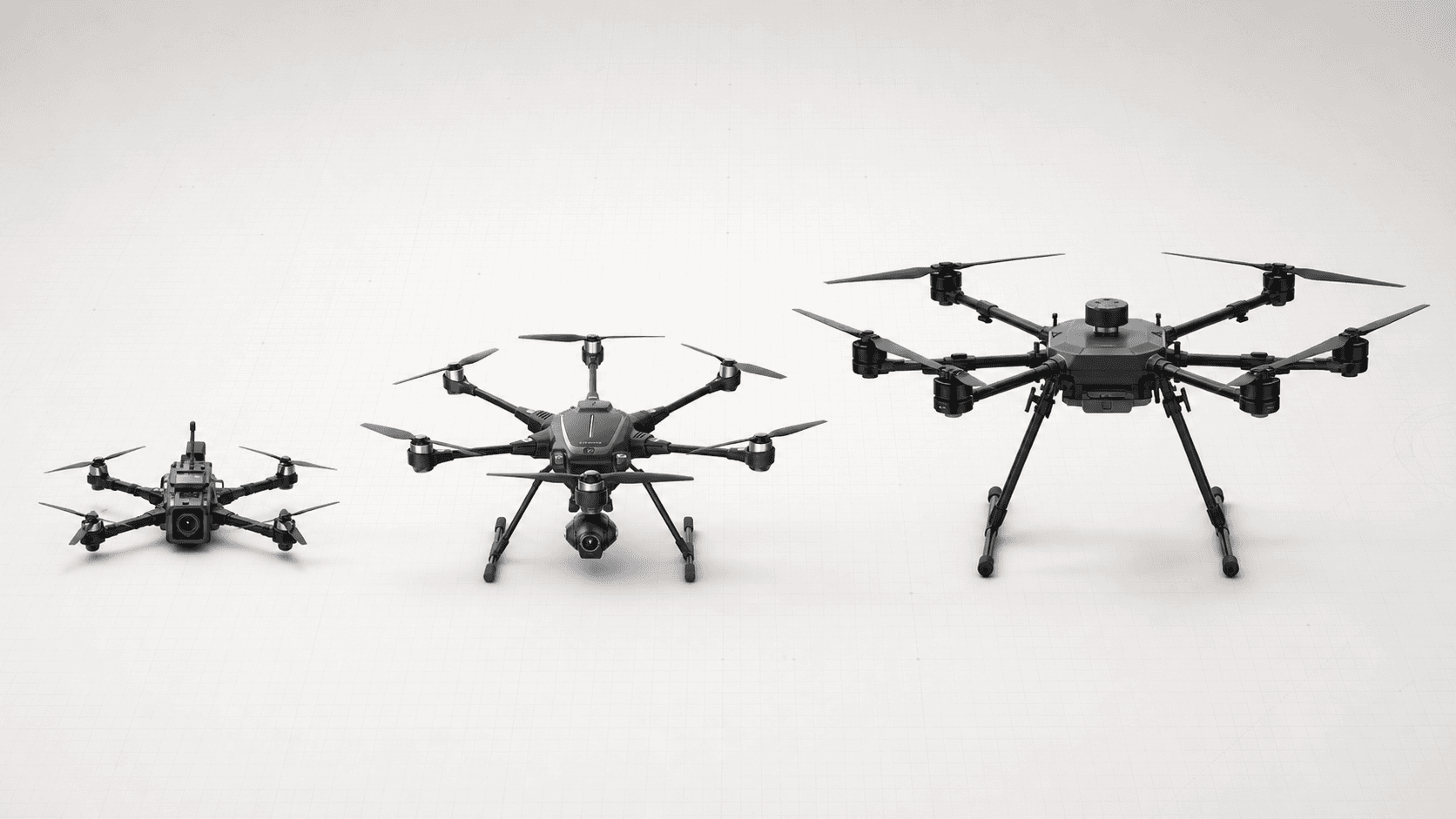 Three illustrative six-rotor platforms of different sizes on a light background